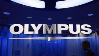Шест банки съдят Olympus