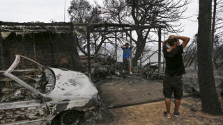 Поразената от пожари Гърция издирва изчезнали свои граждани